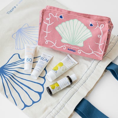 Limited Edition Pouch + 2 travel size suncare PLUS Limited Edition Tote Bag + 2 travel size body